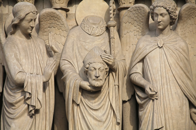 Saint Denis cephalophore on facade of Notre Dame de Paris